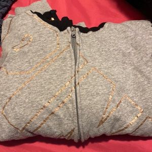 Jacket sleeves are sequins